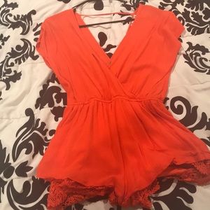 Cute orange romper!